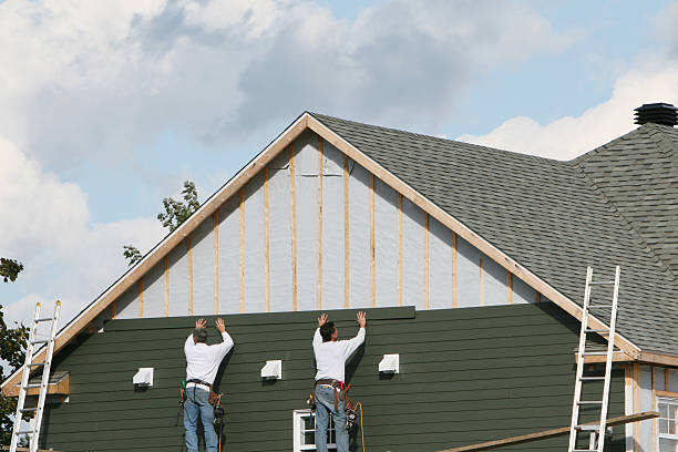 Professional Storm Damage Siding Repair technician working in Alexis, NC